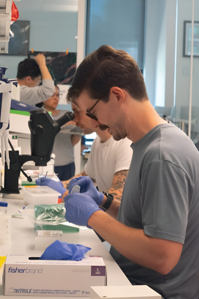 Arc Institute researcher Matthew Carter is pipetting substances to be used for future tests. Carter is a phD fellow in Thaiss lab of Arc Institute, led by core investigator Christophe Thaiss, the team dedicated their efforts in researching topics like elements of the biology of aging, core principles of body-brain communication, and how environmental and lifestyle factors interact with the human body.

