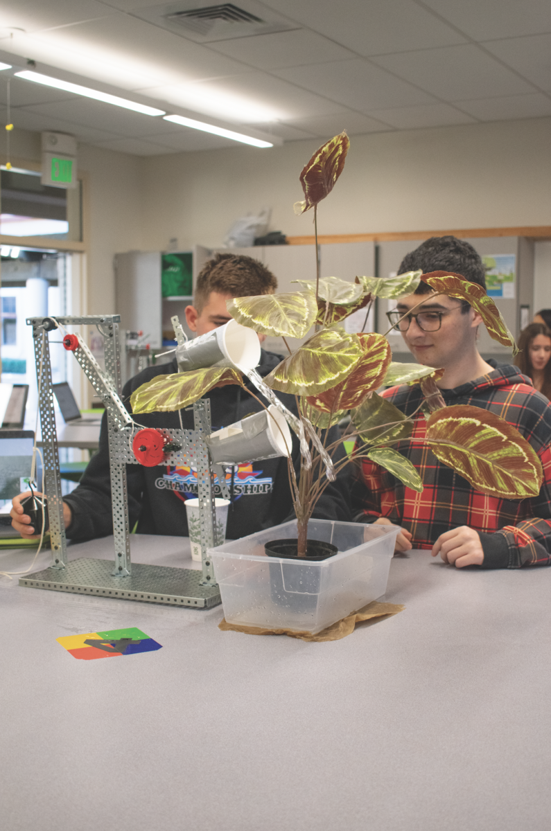 SPLASH – Senior Sean Lehman said he enjoyed learning while thinking of an unconventional way of doing an everyday task. “I’ve never seen a cooler way to water a plant,” Lehman said. “Also, while you’re making a plant watering project like this, you can learn about physics and engineering. Plants need water, so why not come up with a fun way to do it? That’s what makes this better than normally watering the plant.”