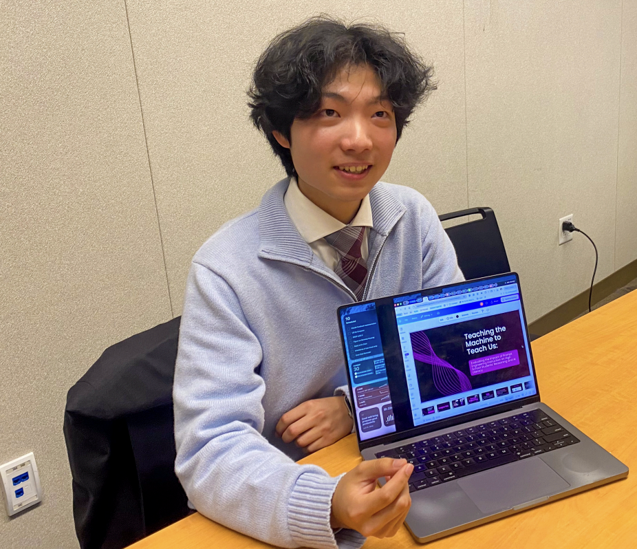 Jerry Yan, an AP Research student, presents his artificial intelligence research. Yan has been researching how
PAUSD students engage with AI, and
how AI literacy education can reshape
its use. “I've been doing true experimental research stemming from how we use AI at home,” Yan said. “If I have an MCQ quiz that I want to do, do I want to just store it all into chat GPT or are there other ways that we can prompt you to not do that?”